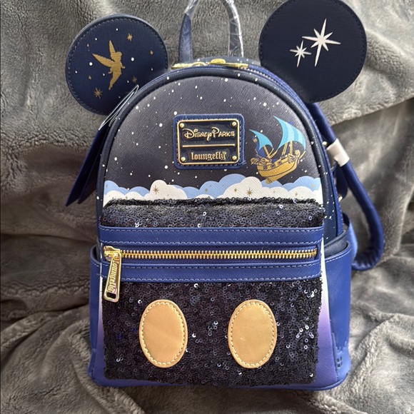 Loungefly Handbags - Loungefly DisneyParks Peter Pan’s Flight mini backpack